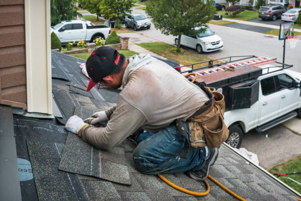 Professional Roof Leak Repair technician working in Moores Hill, IN
